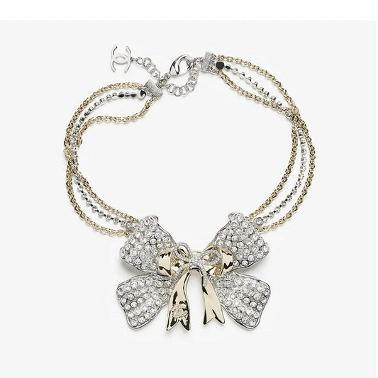 18K  Chanel 25K Bow Tie Choker Necklace